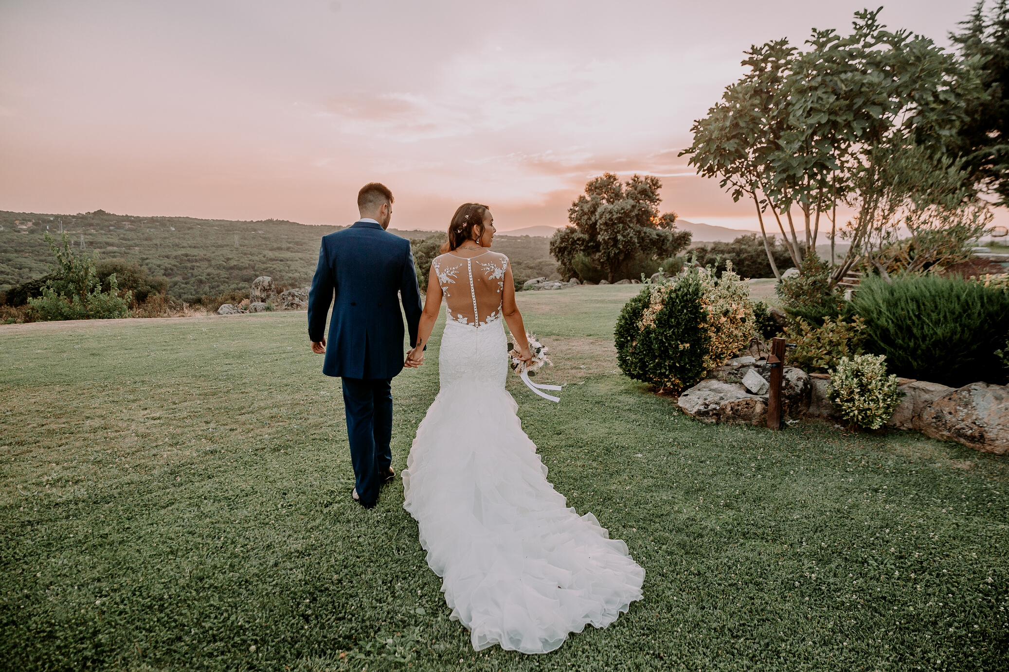 Couple Holding Hands While Walking Together